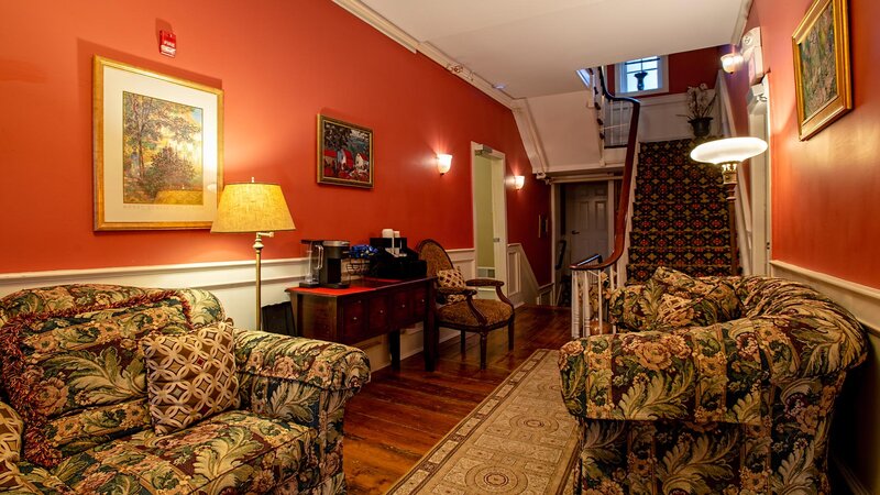 Downstairs lounge area with sofas